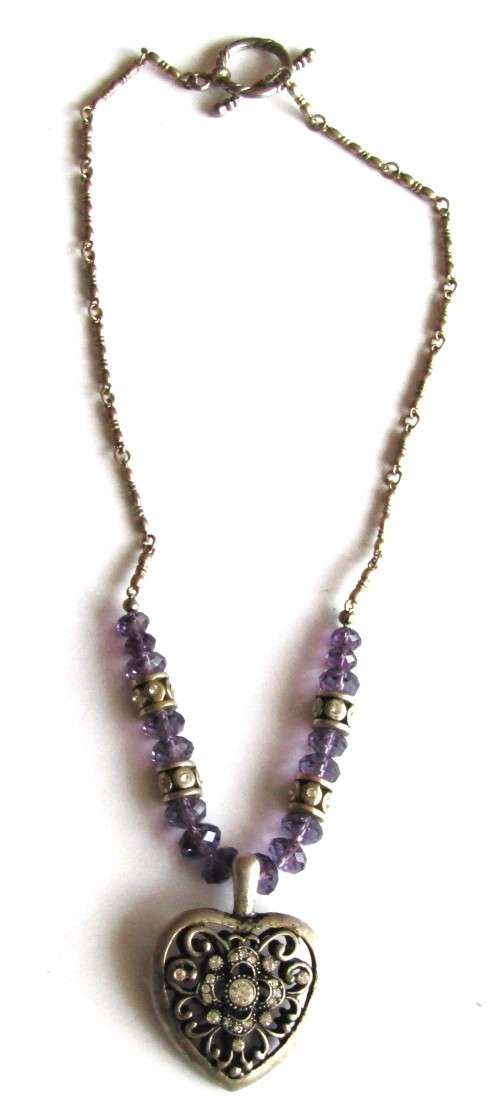 Vintage silver tone heart pendant necklace with clear and purple faceted crystal