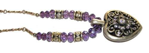 Vintage silver tone heart pendant necklace with clear and purple faceted crystal