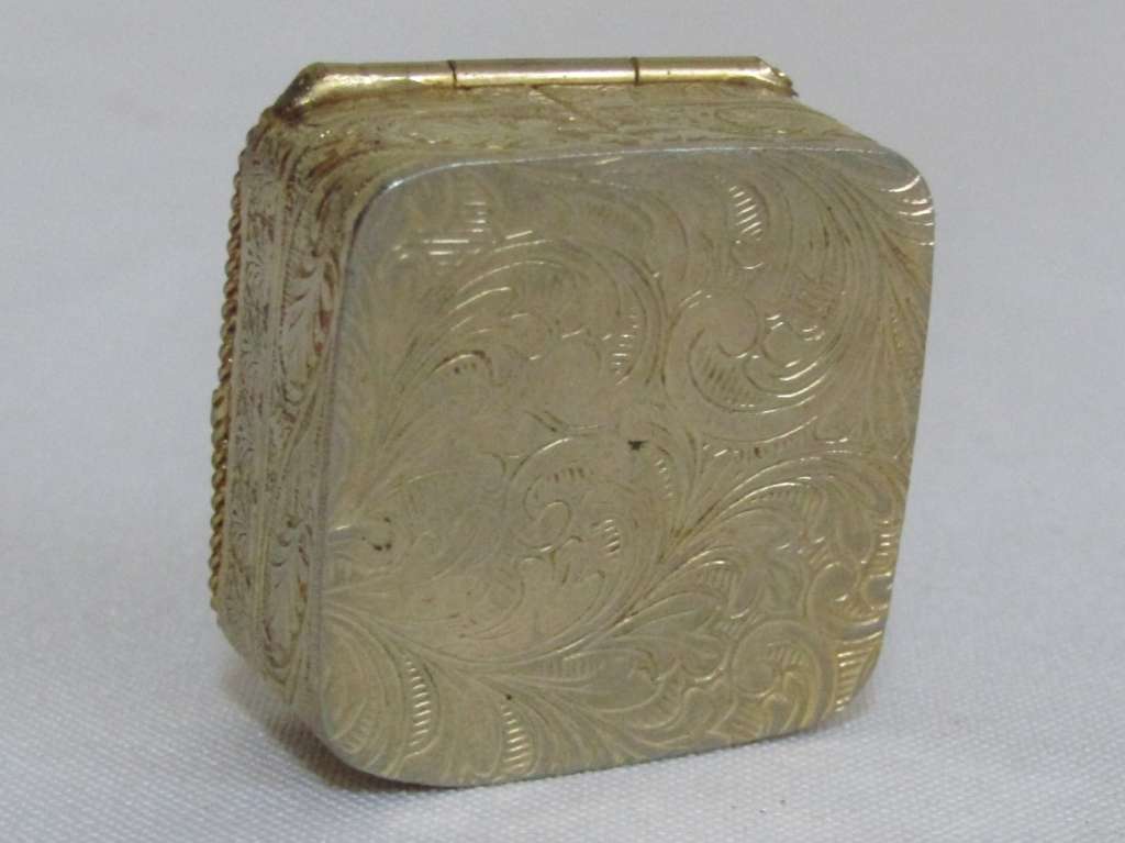Small square gold tone pill box with cobalt blue floral bouquet ceramic decoration