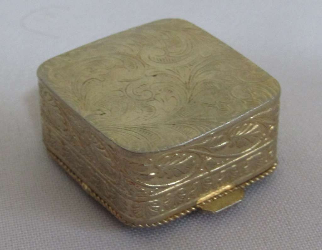 Small square gold tone pill box with cobalt blue floral bouquet ceramic decoration