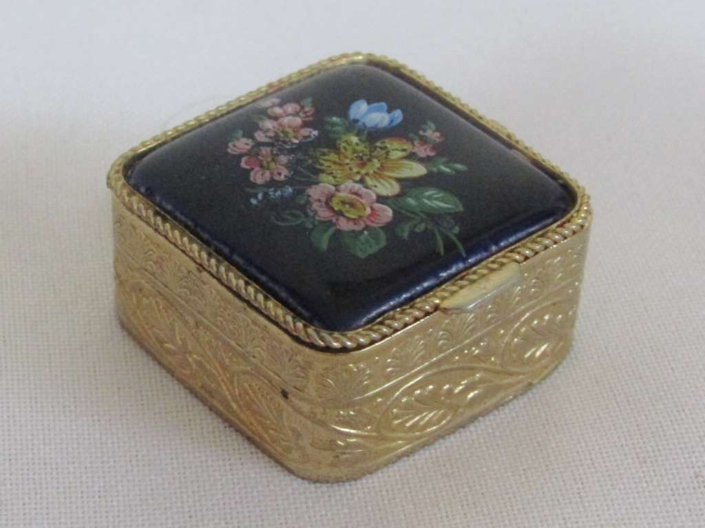 Small square gold tone pill box with cobalt blue floral bouquet ceramic decoration