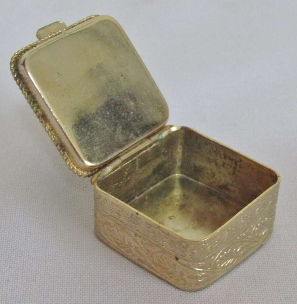 Small square gold tone pill box with cobalt blue floral bouquet ceramic decoration