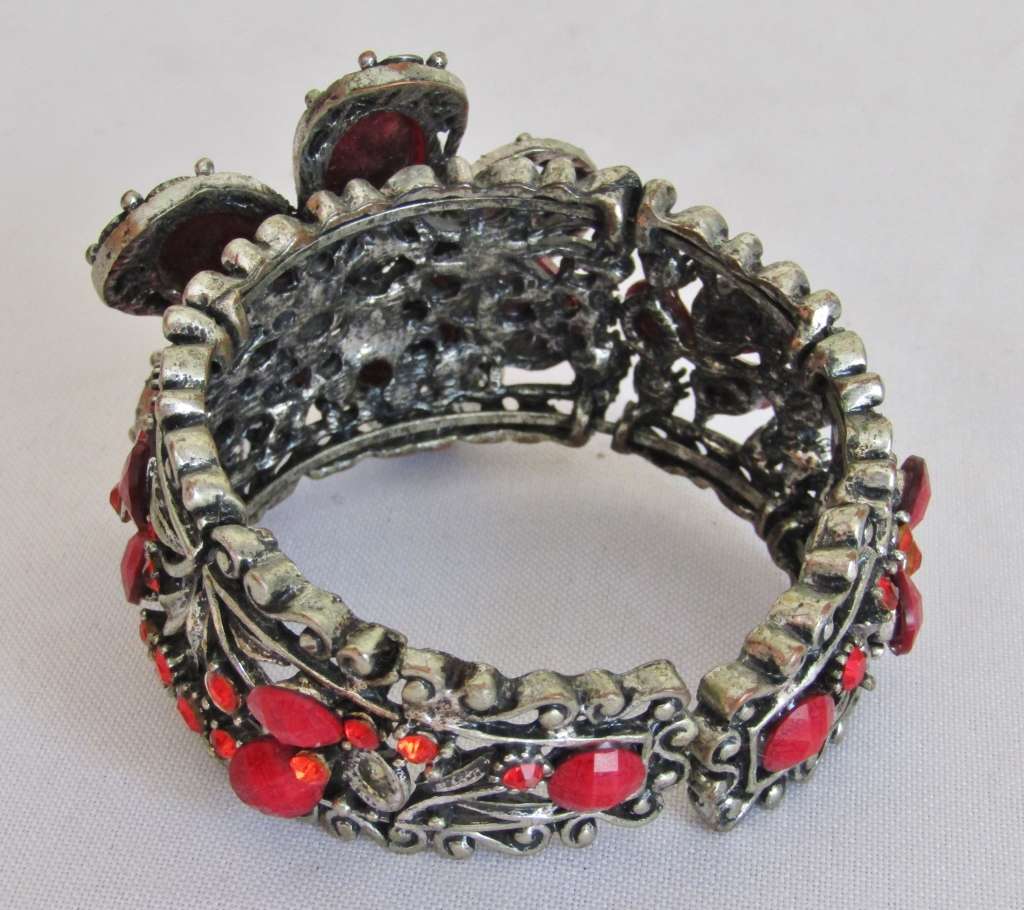 Vintage antique silver tone cuff bracelet with faceted clear and opaque red crystal