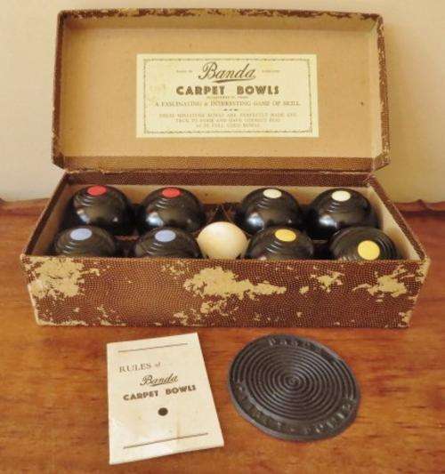 Vintage 1930's set of Banda carpet bowls in original box with rules booklet and rubber toe mat