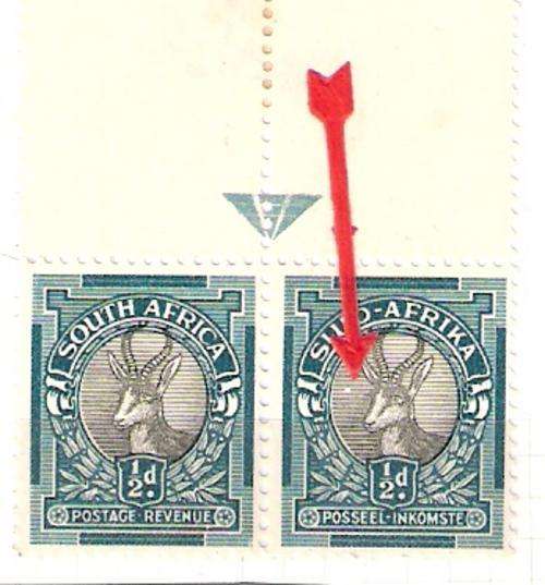 HYPH 1/2d UMM  TOP ARROW PAIR  WITH WHITE DOT LETFT OF BUCK'S  EYE