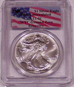 THIS COIN WAS RECOVERED FROM UNDER THE RUBBLE IN THE WORLD TRADE CENTRE AFTER THE 9-11 ATTACKS.