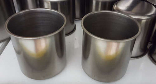 Mini stainless steel cup.