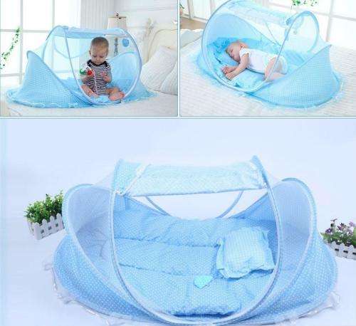 BIG portable baby bed with mosquito net. Pink/Blue polka dot.