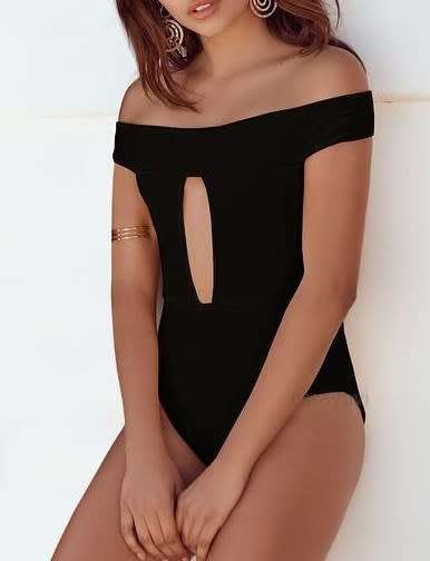 ABSOLUTELY STUNNING Modern Black Swimsuit. SIZE M. View our other R1 auctions!