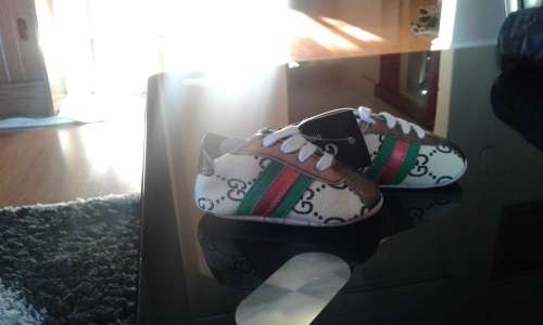GUCCI BRANDED BABY SHOES.