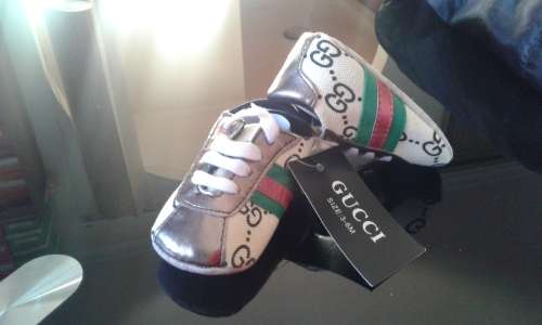 GUCCI BRANDED BABY SHOES.