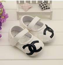 CHANEL BABY PUMPS. WHITE