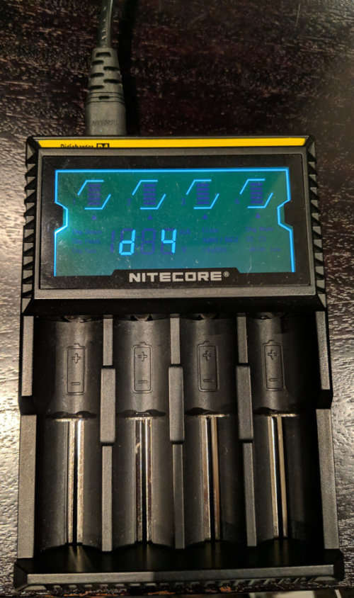 Nitecore Digi D4 with 4x Duracell AA