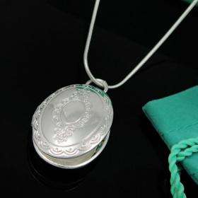 Stunning Silver Locket AT LOW LOW PRICE!!Place your photo inside!! in stock and ready to ship!
