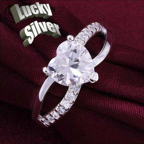Fantastic price!! Sterling Silver - filled Ring with simulated diamonds at LOW LOW price