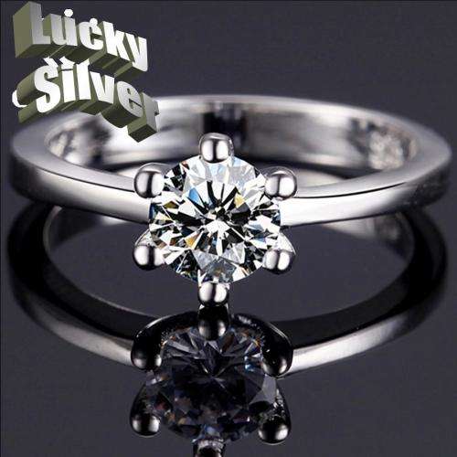 Fantastic price!! Sterling Silver - filled Ring with simulated diamonds at LOW LOW price