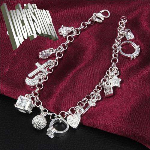 Fantastic price!! Sterling Silver - filled  Charm Bracelet  with detail at LOW LOW price