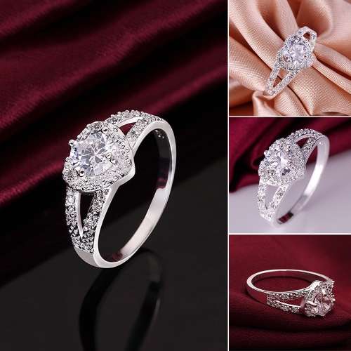 Fantastic price!! Sterling Silver - filled Ring with simulated diamonds at LOW LOW price