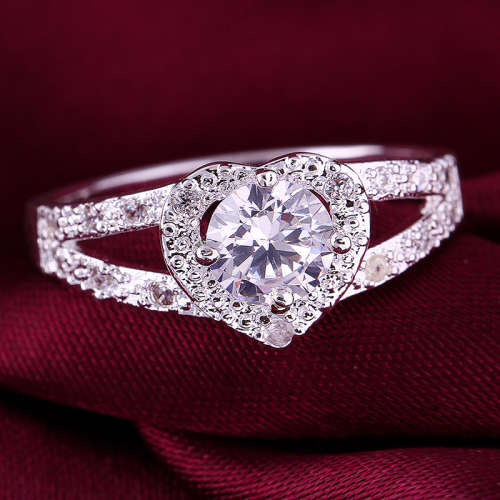 Fantastic price!! Sterling Silver - filled Ring with simulated diamonds at LOW LOW price