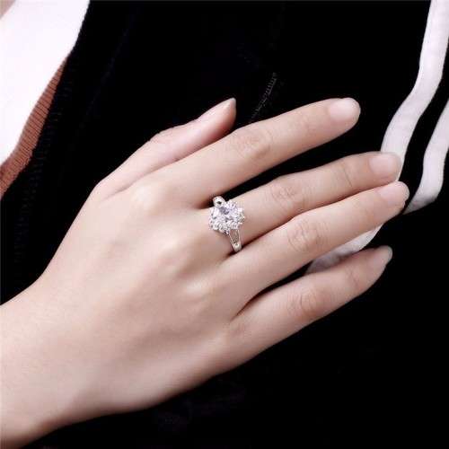 Fantastic price!! Sterling Silver - filled Ring with simulated diamonds at LOW LOW price