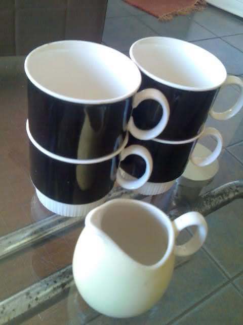 Delightful artdeco style Continental cup and milk jug colletion