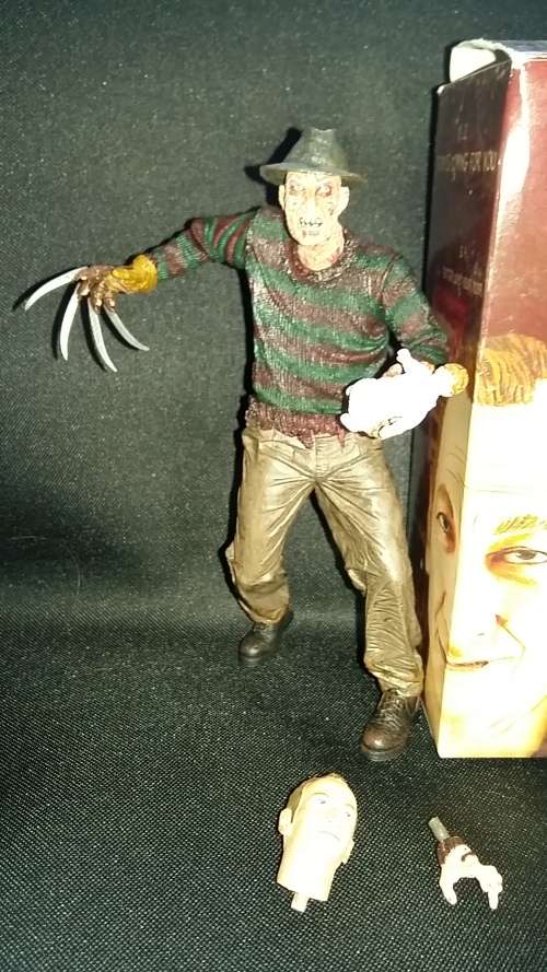 Freddy Kruger Figure and DVD Boxset lot