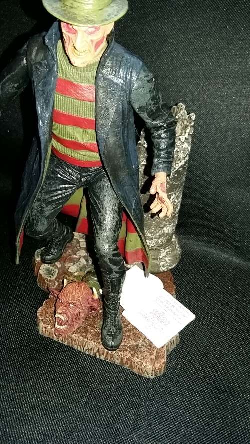 Freddy Kruger Figure and DVD Boxset lot