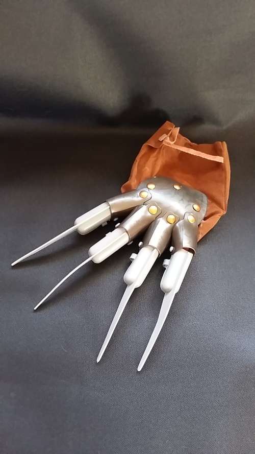 Freddy Kruger Figure and DVD Boxset lot