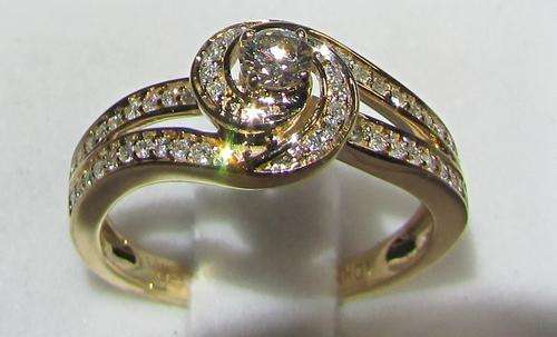 **SCINTILLATING [R37698]** EYE CLEAN [0.700ct] SWIRL DIAMOND RING [3.272g] YELLOW GOLD