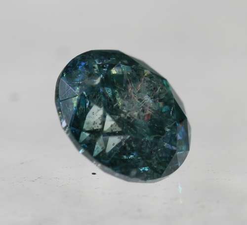 **IGL CERTIFIED R12161**0.51CT ENHANCED NATURAL RARE BLUE ROUND CUT DIAMOND Si2+-