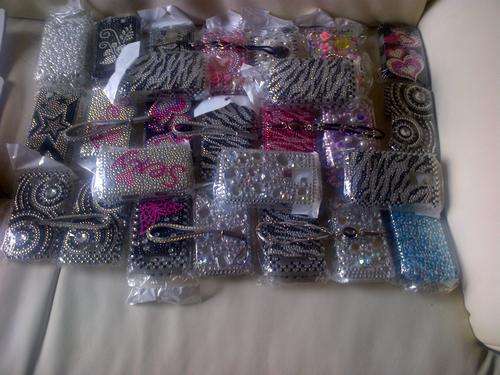 ONE BIDDER TAKES ALL BLACKBERRY COVERS+STRAPS+1 PAYMENT OF R65 POSTAGE FOR ALL OF THEM