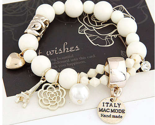 SENSATIONAL!! GOLD PLATED CHARM BRACELET WITH SIMULATED DIAMOND ERV R999