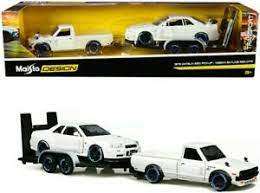 1973 DATSUN 620 PICKUP and NISSAN SKYLINE R34 and TRAILER SET 1:24 CARS MAISTO 32754