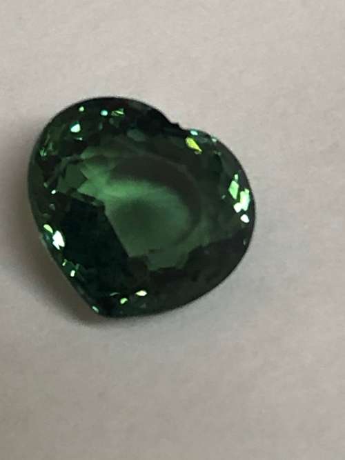 rare heart shaped paraiba tourmaline bluish green with valuation certificate