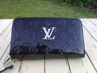 **Louis Vuitton Black Beauty Hand Purse/Wallet**