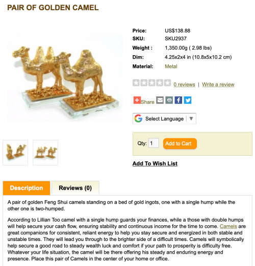 A Pair of Golden `World of Feng Shui` Camels