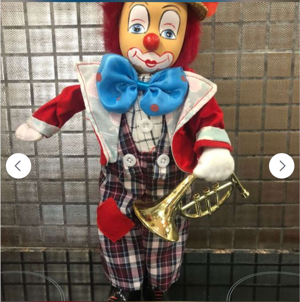 Stunning Porcelain Clown with Grass Hat