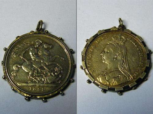 A 1889 SILVER BRITTISH CROWN IN A STERLING SILVER PENDANT.