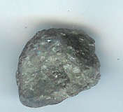 A VERY RARE ROUGH,UNCUT 18.19 CT TANZANITE.