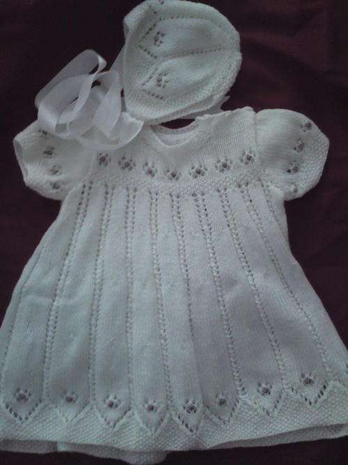 Beautifull knitted baby dress and bonnet