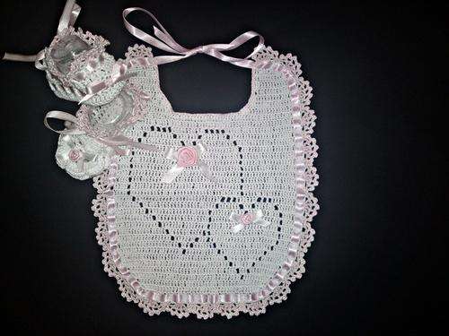 Pink and white crochet baby bib and booties