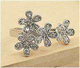 EXQUISITE 4 FLOWERS WITH GLASS RING