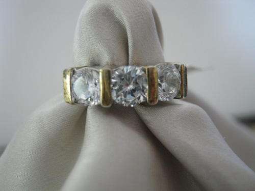 GOLD TONE ELECTROPLATED RING.  SIZE 5