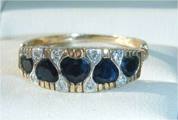 SUPERB RING FOR YOUR LOVED ONE.  9CT GOLD WITH SAPPHIRES AND DIAMOND. REAL MACKOY