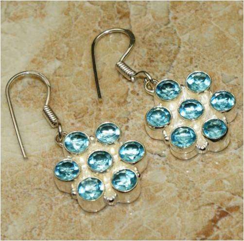 BEAUTIFUL SILVER WITH 7 TOPAZ STONES - EYE CATCHING