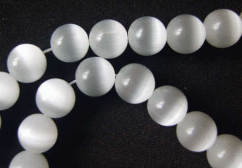 White Cats Eye Rounds, 10mm - Per String (+/- 40 beads)