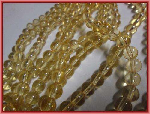FOR A TENNER SALE!! Honey Glass Rounds, 12mm - Per String (+/- 70).