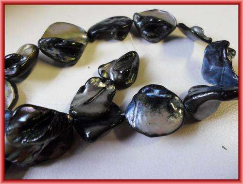 FOR A TENNER SALE!! Charcoal Shell - Per String(+/-19)