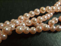 PEACH GLASS PEARLS, 6mm - PER STRING ( +/- 70 per string)