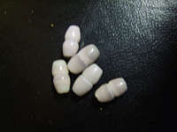 Purple Catseye Ovals, +/- 9mm X 5mm Pack of 20.